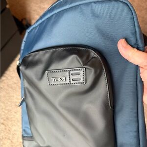 Tumi Blue and Black Sling Bag